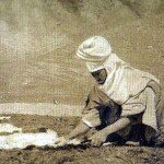 Woman handles fleece.