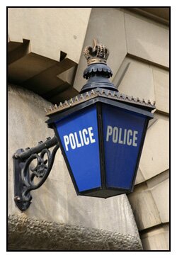Traditional Police station sign in the UK (from Home Office website)